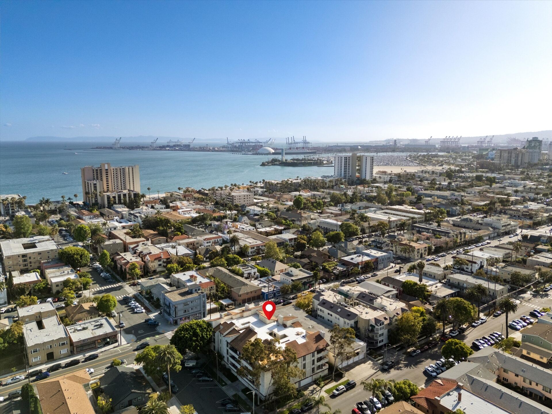 Aerial view of the building with Long Beach harbor in the background