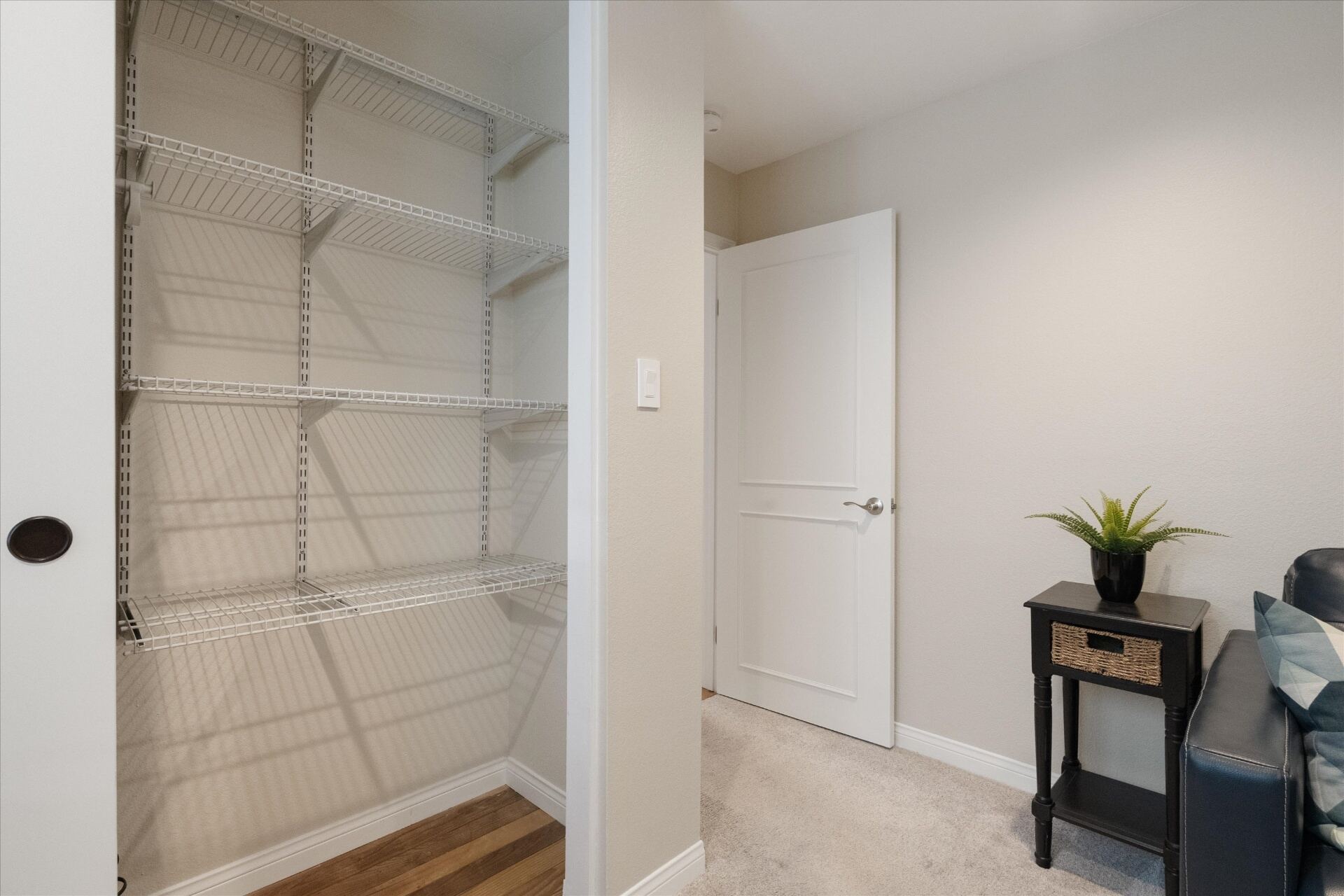 Second bedroom walk-in closet with wire shelving system