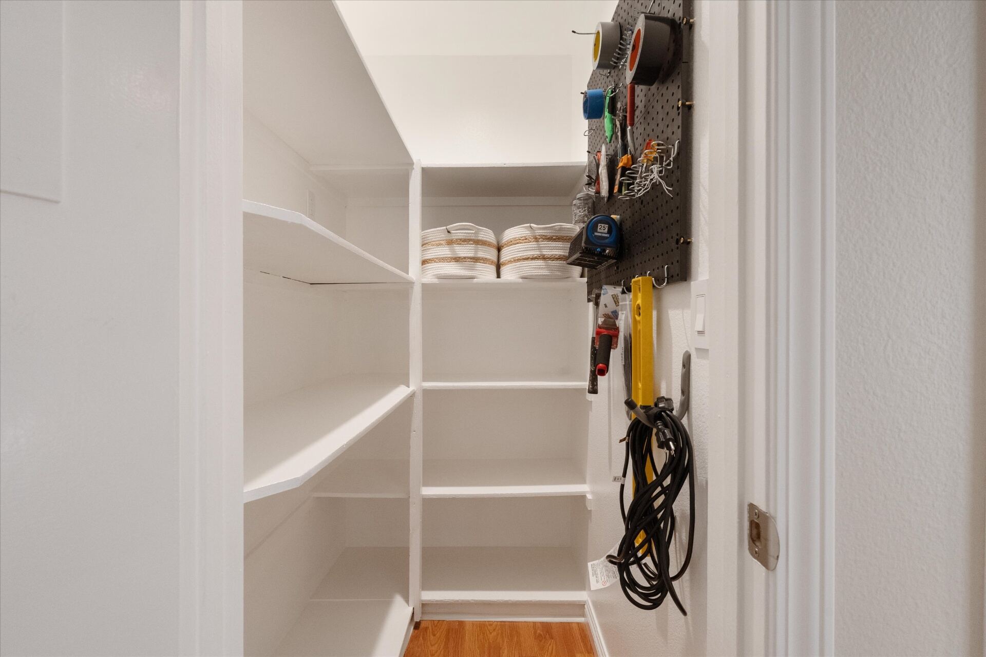 Bonus interior storage closet with built-in shelving